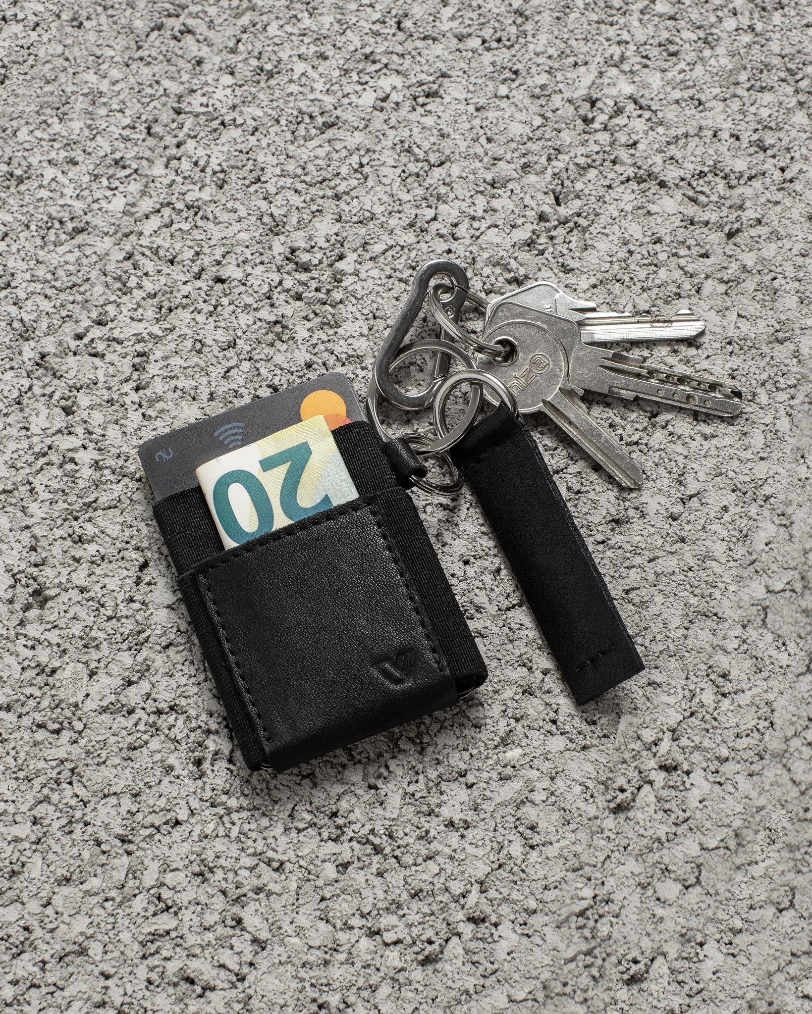 Minimalist black wallet with ring
